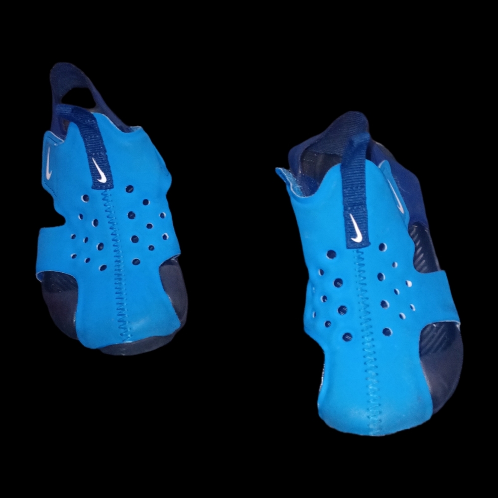 A pair of 9C kids Nike swimming shoes
